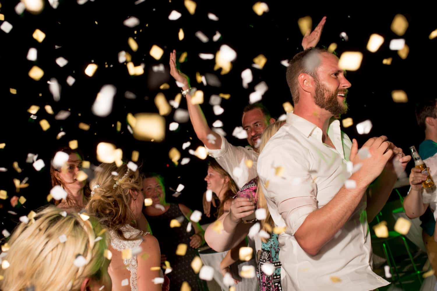 Wedding reception with white and yellow confetti