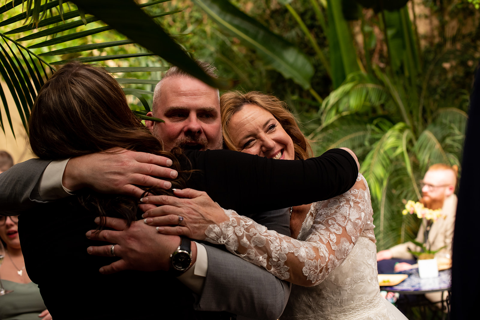 a couple of people that are hugging each other.